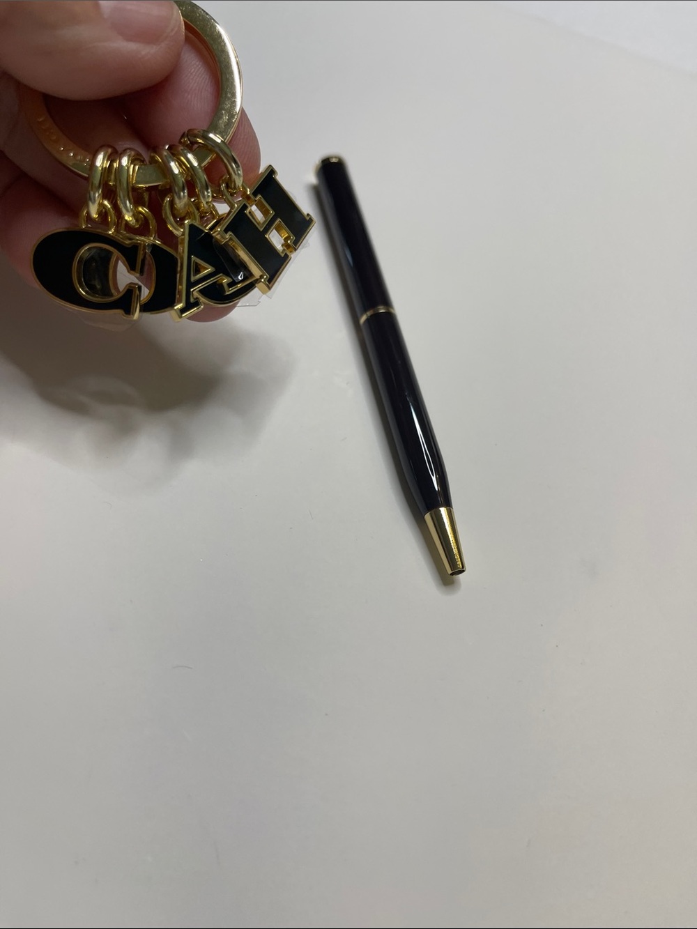 (2) COACH Black and Gold Charm Keyring and (2) hot pink Coach Pens - Picture 3 of 8